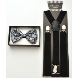 Black Bow tie with white skull prints and black suspenders .