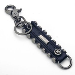 YOK-30 Leather key chain w/studded side design and iron cross.